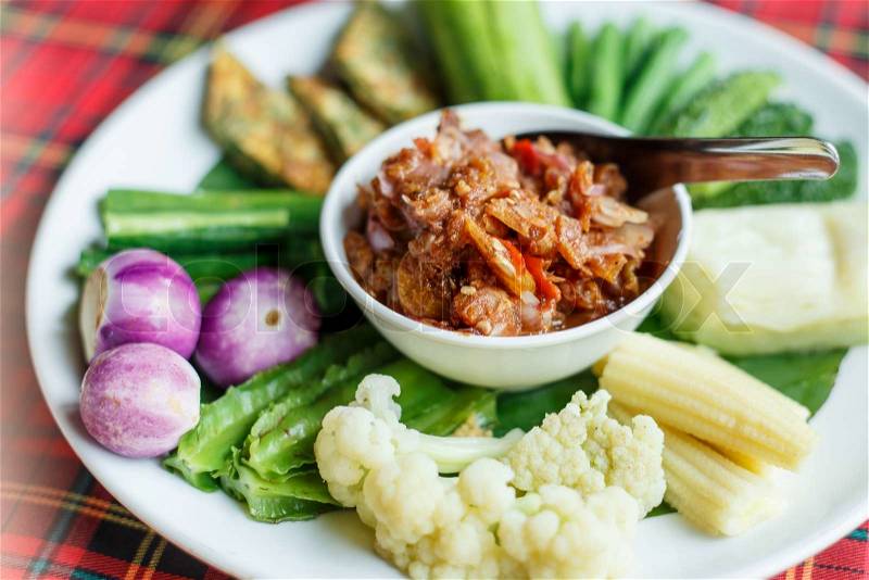 Traditional Thai mix spicy sauce or Nam Prik in Thai name with mix vegetable, stock photo
