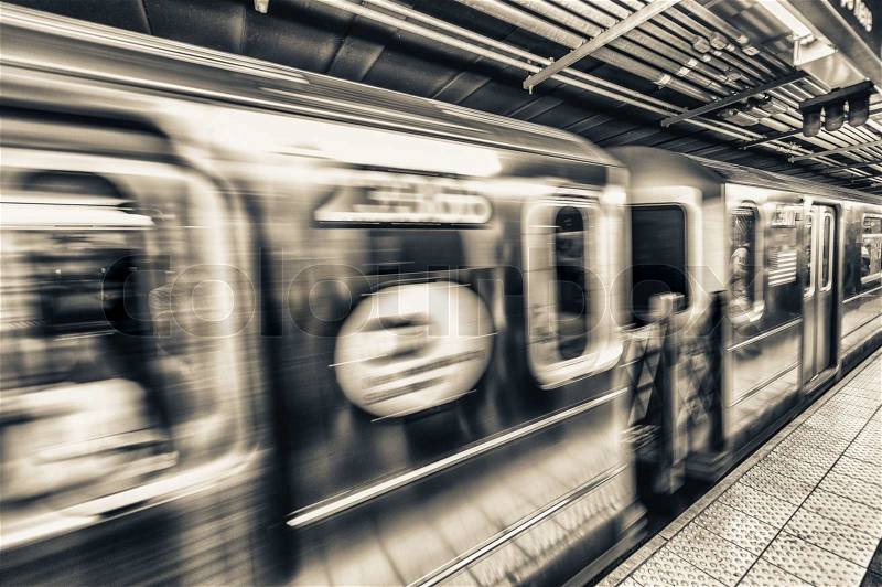 Fast moving train in Manhattan subway - New York transportation concept, stock photo