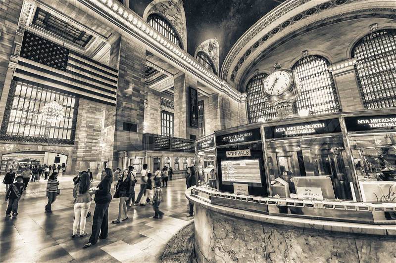NEW YORK, JUNE 8: commuters and tourists in the grand central station in June 8, 2013 in New York. It is the largest train station in the world by number of platforms: 44, with 67 tracks, stock photo