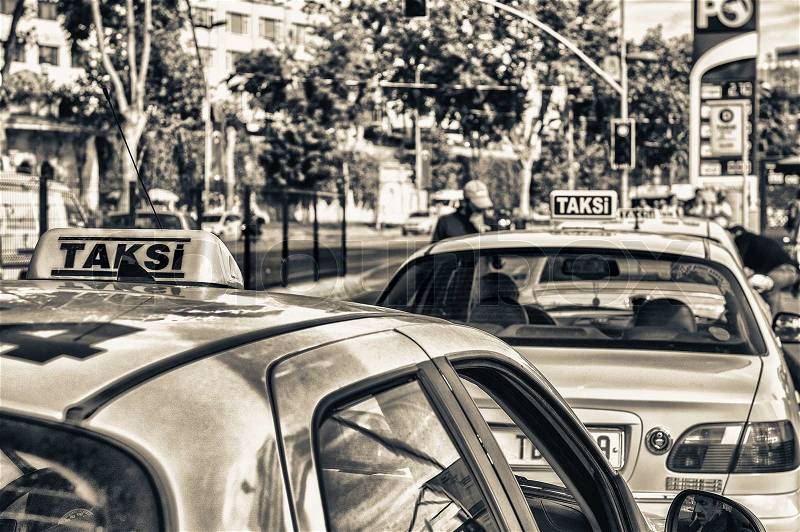 ISTANBUL, TURKEY - OCTOBER 23, 2014: Taxis await customers along city streets. In Istanbul there are almost 20,000 taxis, most of them powered by clean LPG propane gas, stock photo