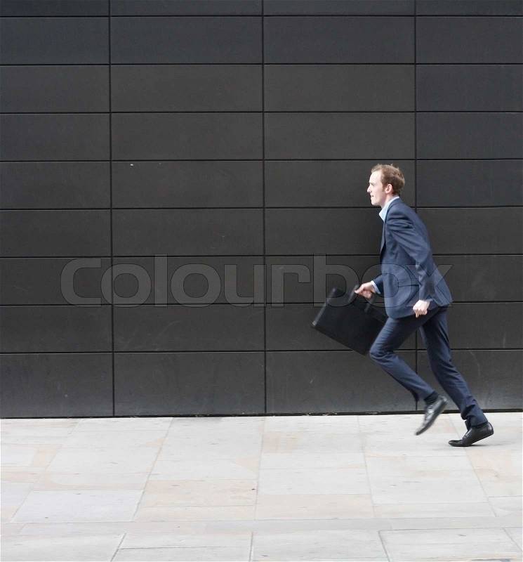 Business man running, stock photo