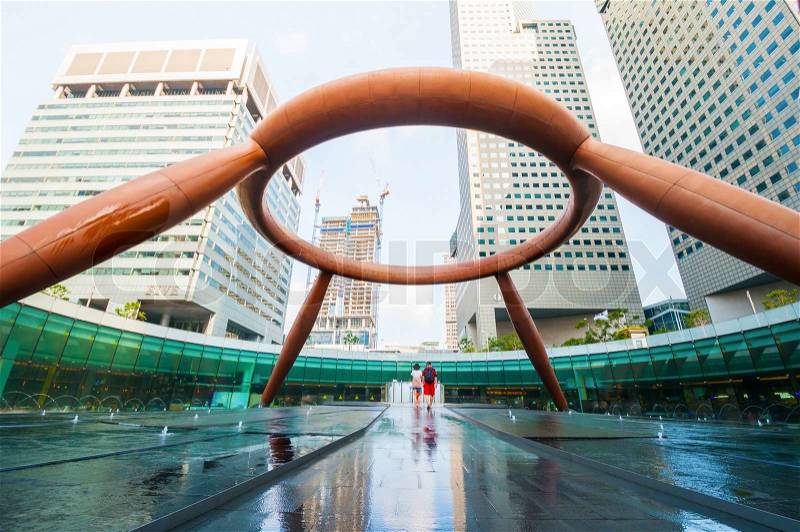 SINGAPORE - MARCH 10, 2014: The Fountain of Wealth. Fountain of Wealth appears like a golden ring in the palm of the hand and was designed by Tsao & McKown Architects with emphasis on feng shui, stock photo