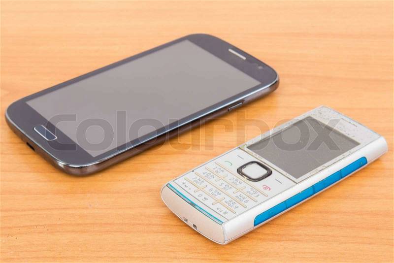 Two of mobile phone which different of technology, stock photo