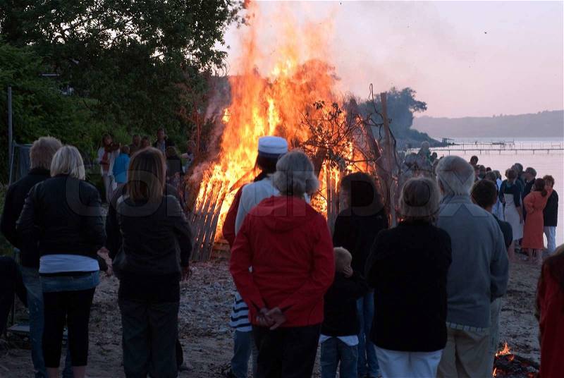 People close to midsommer bonfire, stock photo