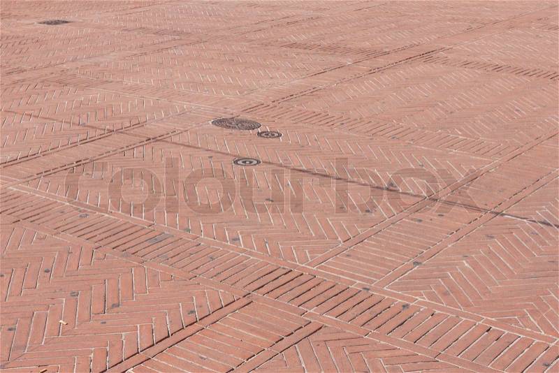 The stone pavement town square as the background texture, stock photo