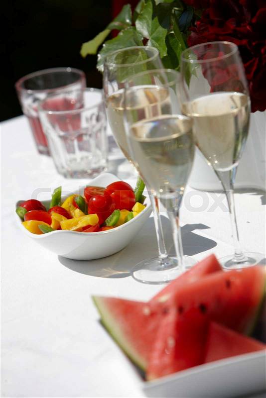 Summer food - watermelon and white wine, stock photo