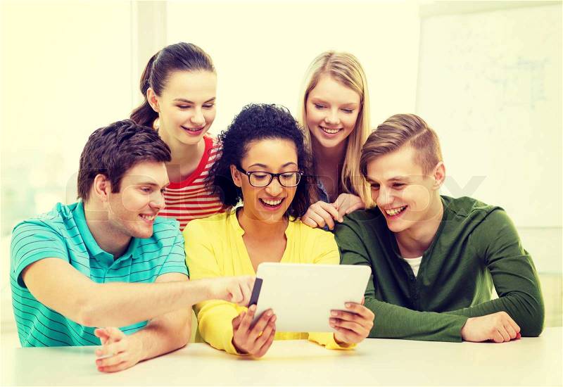 Education, technology and college concept - five smiling students with tablet pc computer at school, stock photo
