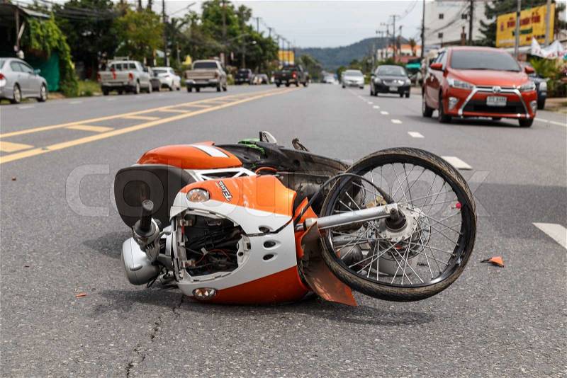 PHUKET, THAILAND - NOVEMBER 3 : Van accident on the road and crashed with motorcycle which causing the rider serious injury. November 3, 2014 in Phuket Thailand, stock photo