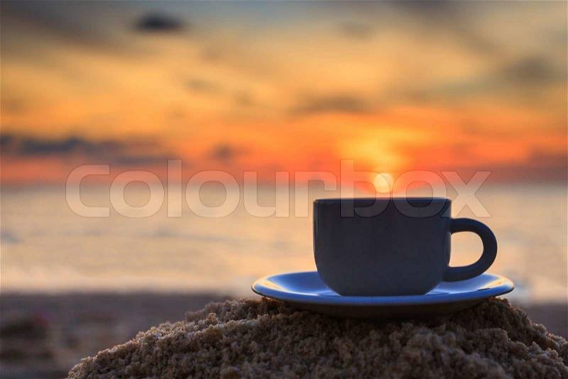 Coffee cup and sunset, stock photo