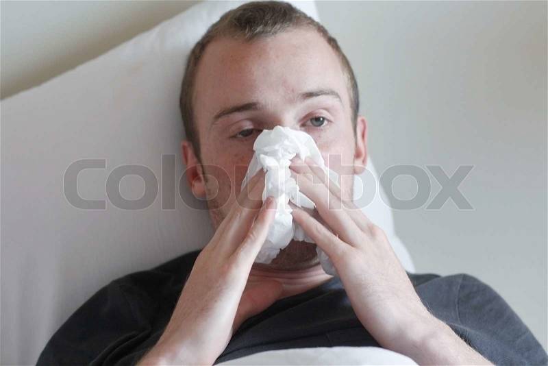 A man with the flu, stock photo