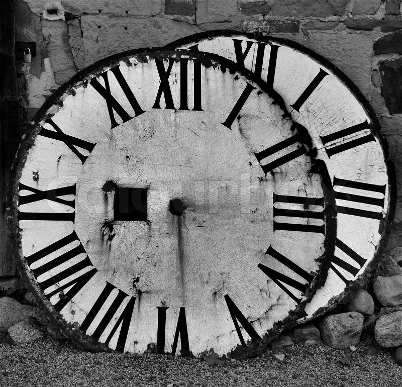 Clock faces an old clock tower, stock photo