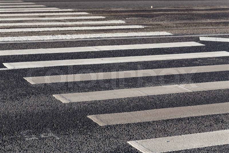 Pedestrian zebra crossing white stripes on the road, stock photo