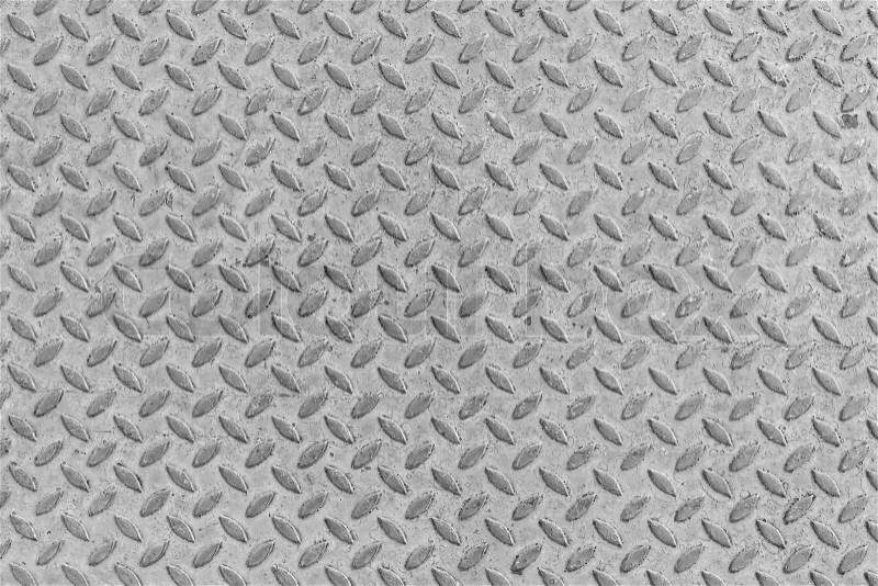 Metal seamless steel diamond plate texture pattern background, stock photo