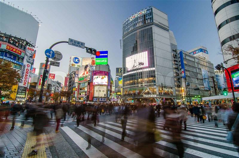 Tokyo, Japan - November 28, 2013: Crowd at the famed crossing of Shibuya district on November 28, 2013 in Tokyo, Japan. Shibuya is a fashion center and nightlife area. , stock photo