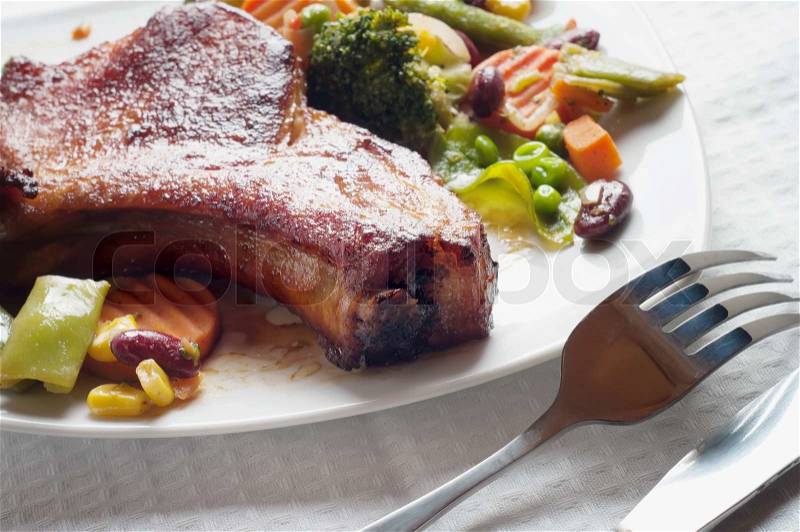 Roasted meat with vegetables, stock photo