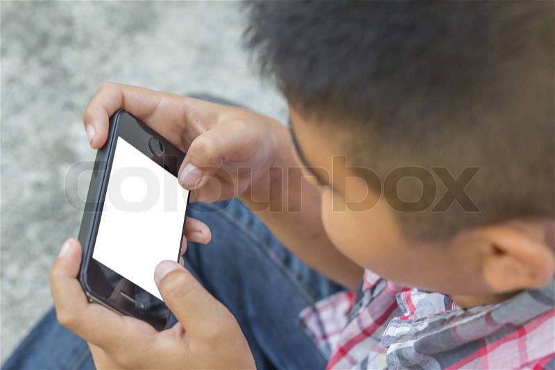 Child with smart phone. Boy play smart phone, stock photo