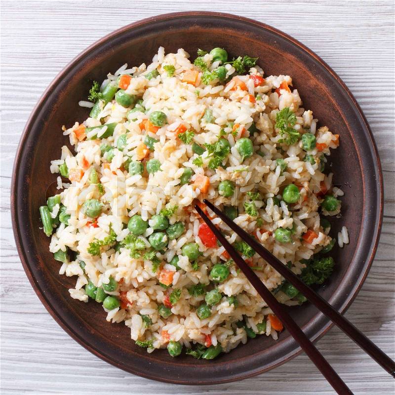 Asian fried rice with egg and vegetables closeup. top view , stock photo