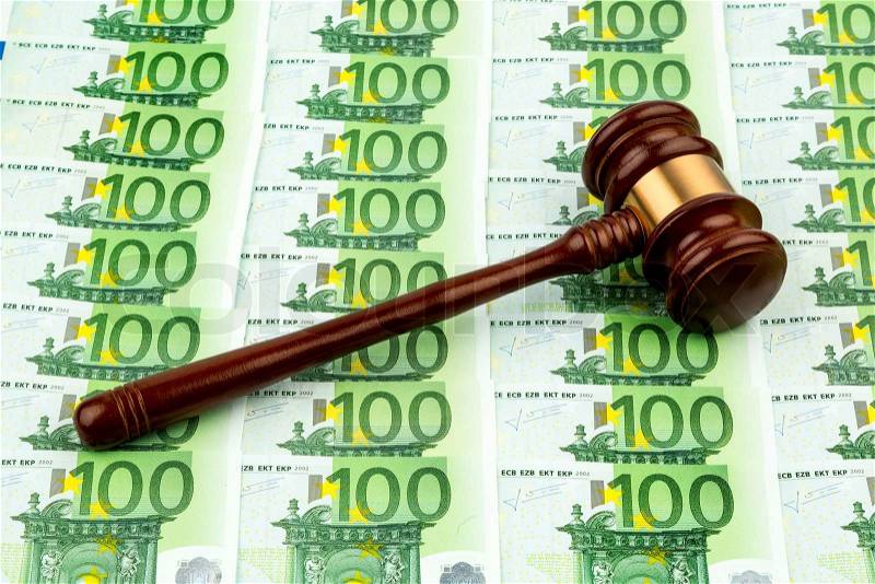 Gavel and euro banknotes. symbolic photo for costs in court, rule of law and auctions, stock photo