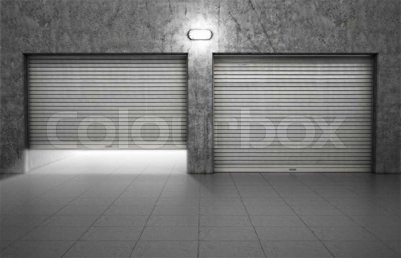 Garage building made of concrete with roller shutter doors, stock photo