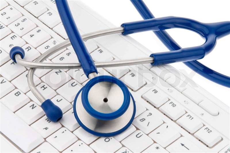 A stethoscope in a hospital is on your computer keyboard, stock photo