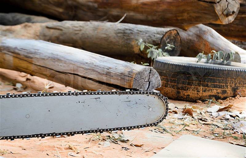 Carpenter use Saw blade for cutting timber, stock photo