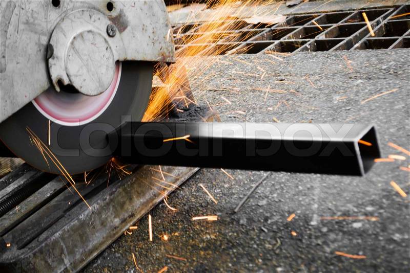 Machines for metal cutting with sparks light, stock photo