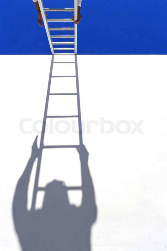 Thai man climbing on ladder for work, stock photo