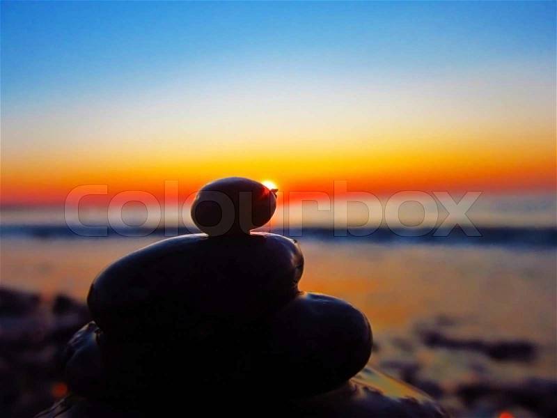 Balanced rocks at sunset , stock photo