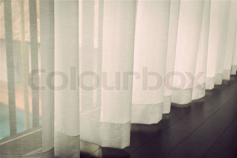 White curtain beside window, stock photo