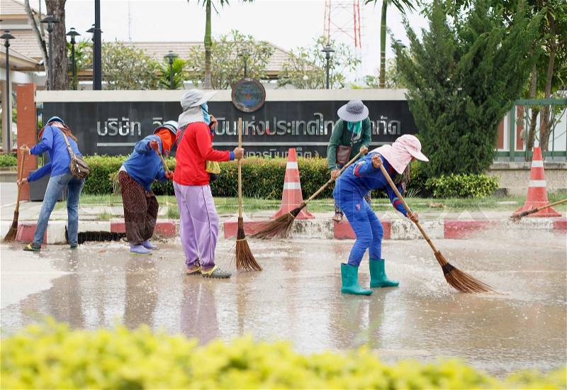 Thai people cleaning the road, stock photo