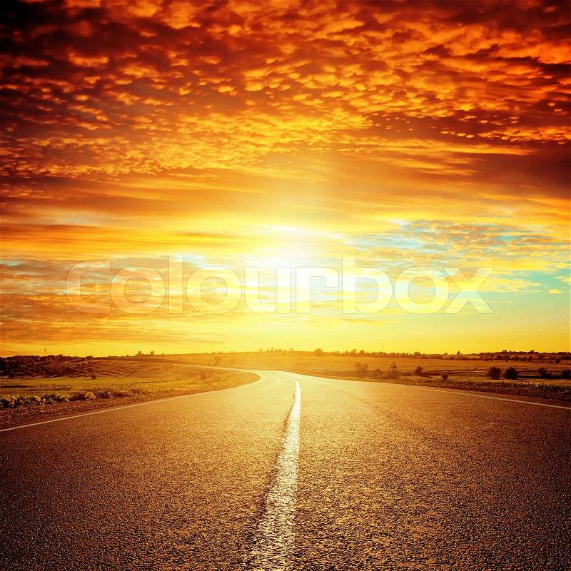 Good red sunset and asphalt road to horizon, stock photo