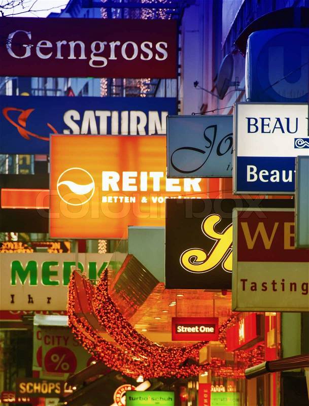 VIENNA - FEBRUARY 2, 2010: Neon signs in city center. The city attracts more than 10 million people each year, stock photo
