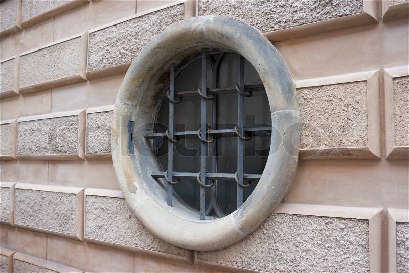 Cirkular secured window in old public building - Copenhagen, Denmark, stock photo