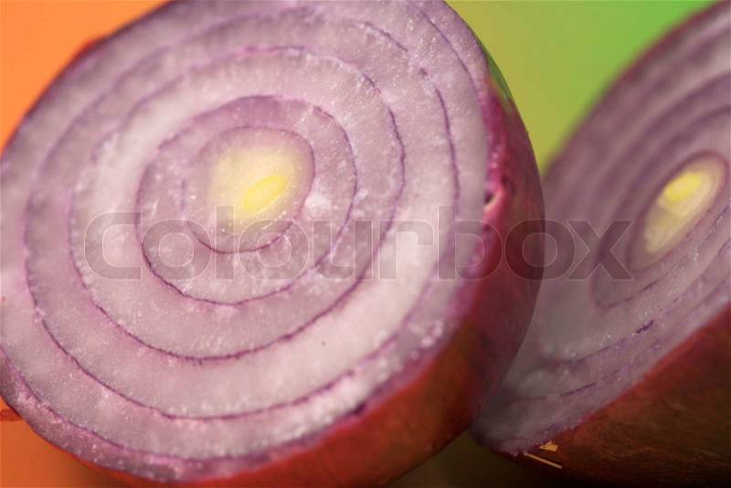 Closeup picture of onions sliced with colorful background, stock photo