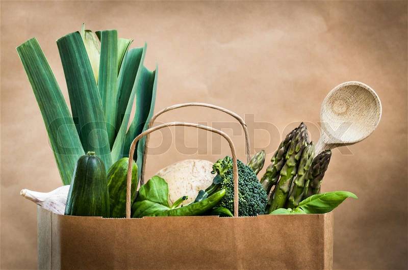 Fresh vegetables in a brown paper bag, stock photo
