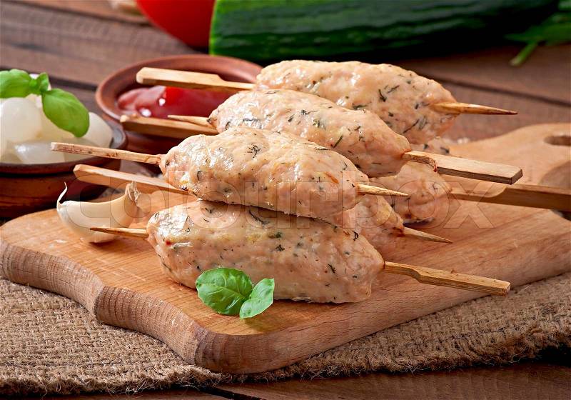 Kebab of minced chicken with dill and parsley, stock photo