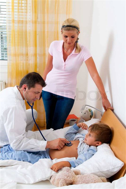 A physician house call. Examined sick child, stock photo