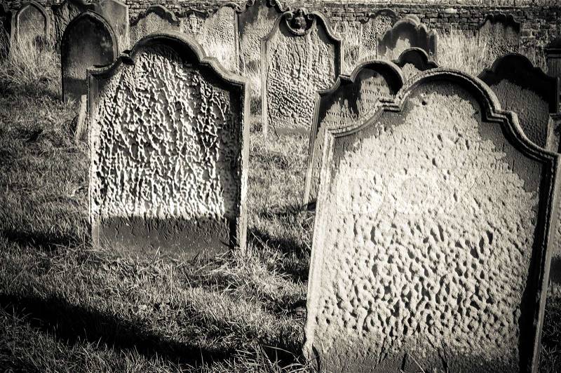 Tomb stones at Whitby cemetery during the night in North Yorkshire,UK. Its attraction as a tourist destination is enhanced by its association with the world famous horror novel Dracula, written by Bram Stoker, stock photo