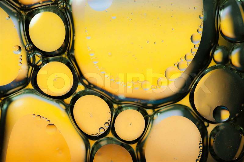 Oil drops on a water surface, stock photo