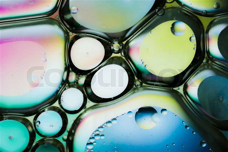 Background of colorful oil drops in water, stock photo