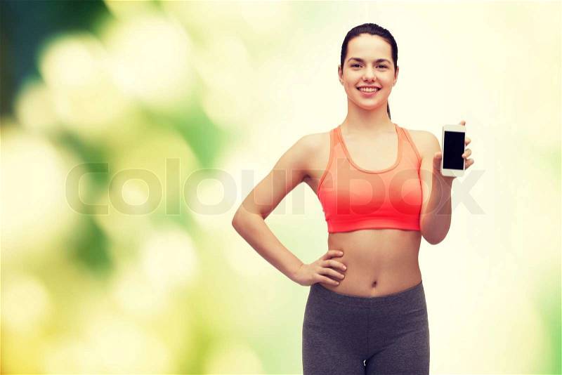 Sport, excercise, technology, internet and healthcare - sporty woman with blank smartphone screen, stock photo