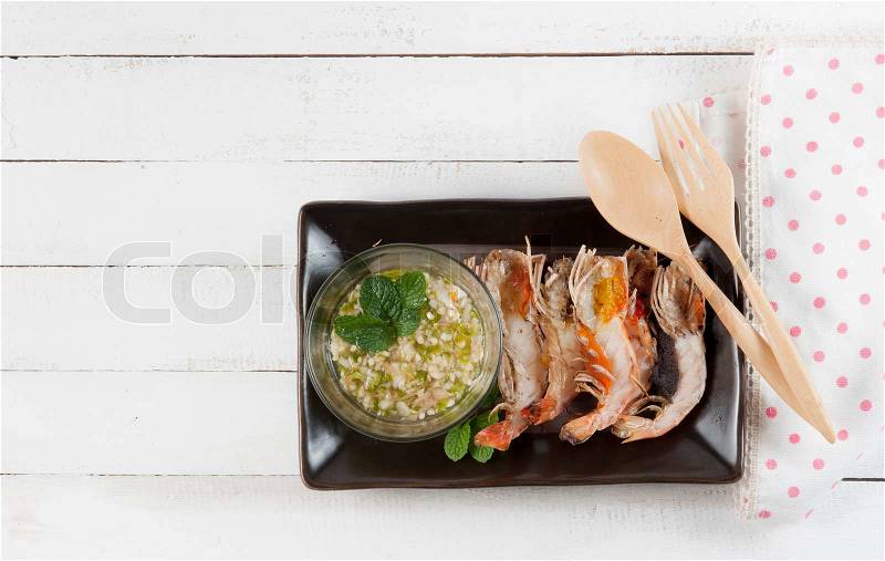 Steamed shrimp with sauce on a white background, stock photo