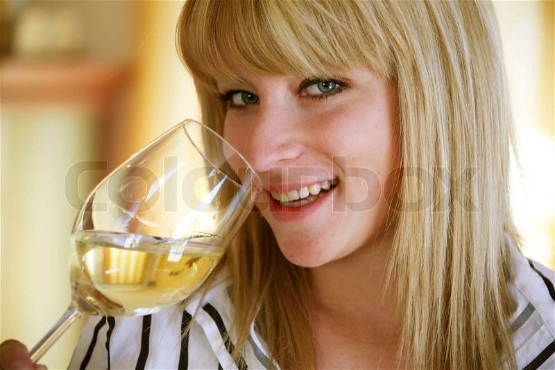 Woman at Verkostungvon alcoholic beverages. Wine Tasting, stock photo