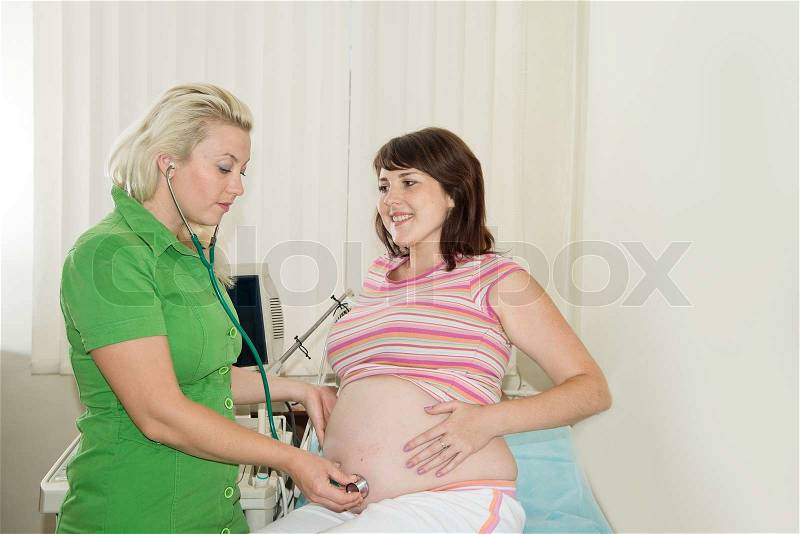 Pregnant woman in childbirth. pregnant woman on reception at the doctor.., stock photo