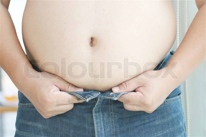 Overweight, fat man and big belly, stock photo