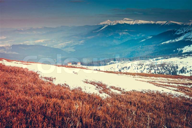 Amazing evening winter landscape. Carpathian, Ukraine, Europe. Retro style filter. Instagram toning effect, stock photo