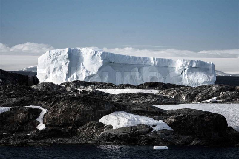 Antarctic iceberg in the snow, stock photo
