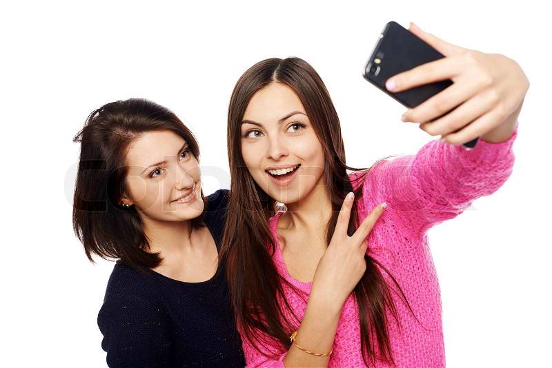 Two Girls Friends Taking Selfie With Smartphone Isolated