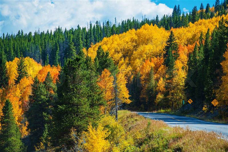 Scenic Fall Colorado Road. Autumn in Colorado Rocky Mountains, stock photo