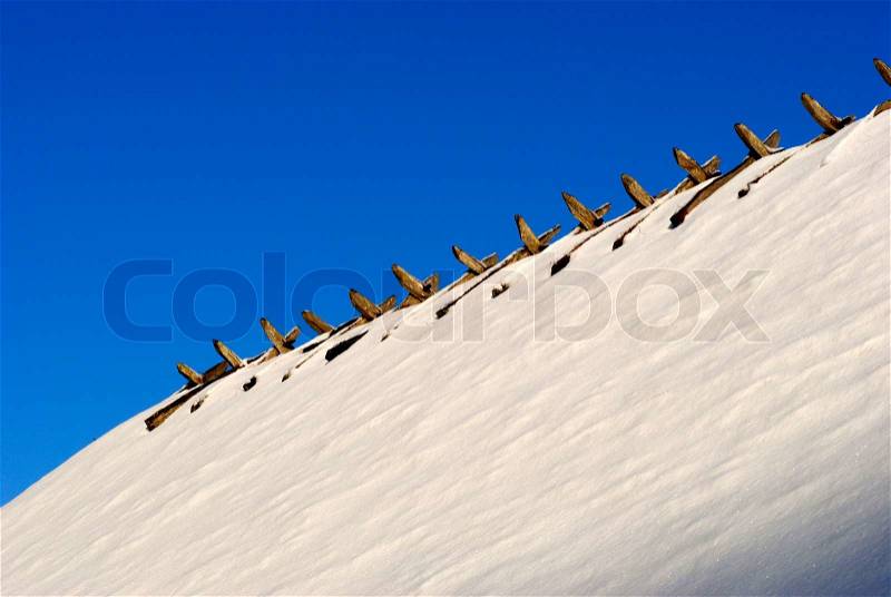 Part of rural house dusted with snow at Christmas time in Denmark, stock photo